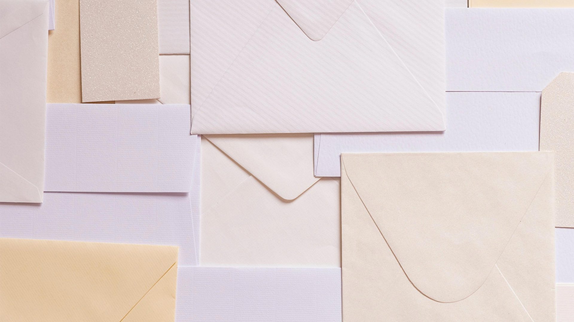 lots of white envelopes piled up