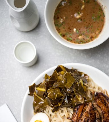 ramen bowls with a dark brown broth